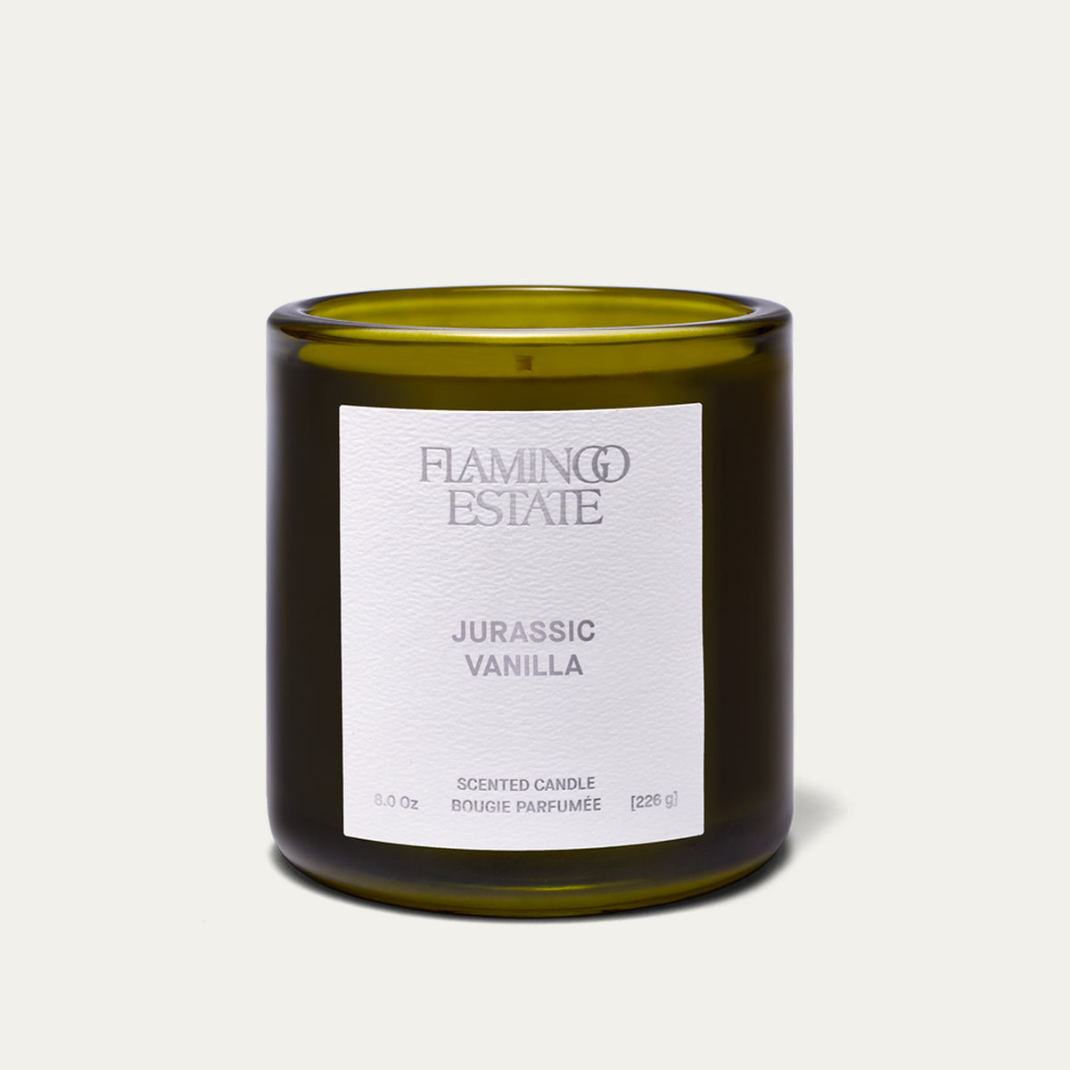 Photo of the flamingo estate jurassic vanilla candle on a blank backdrop