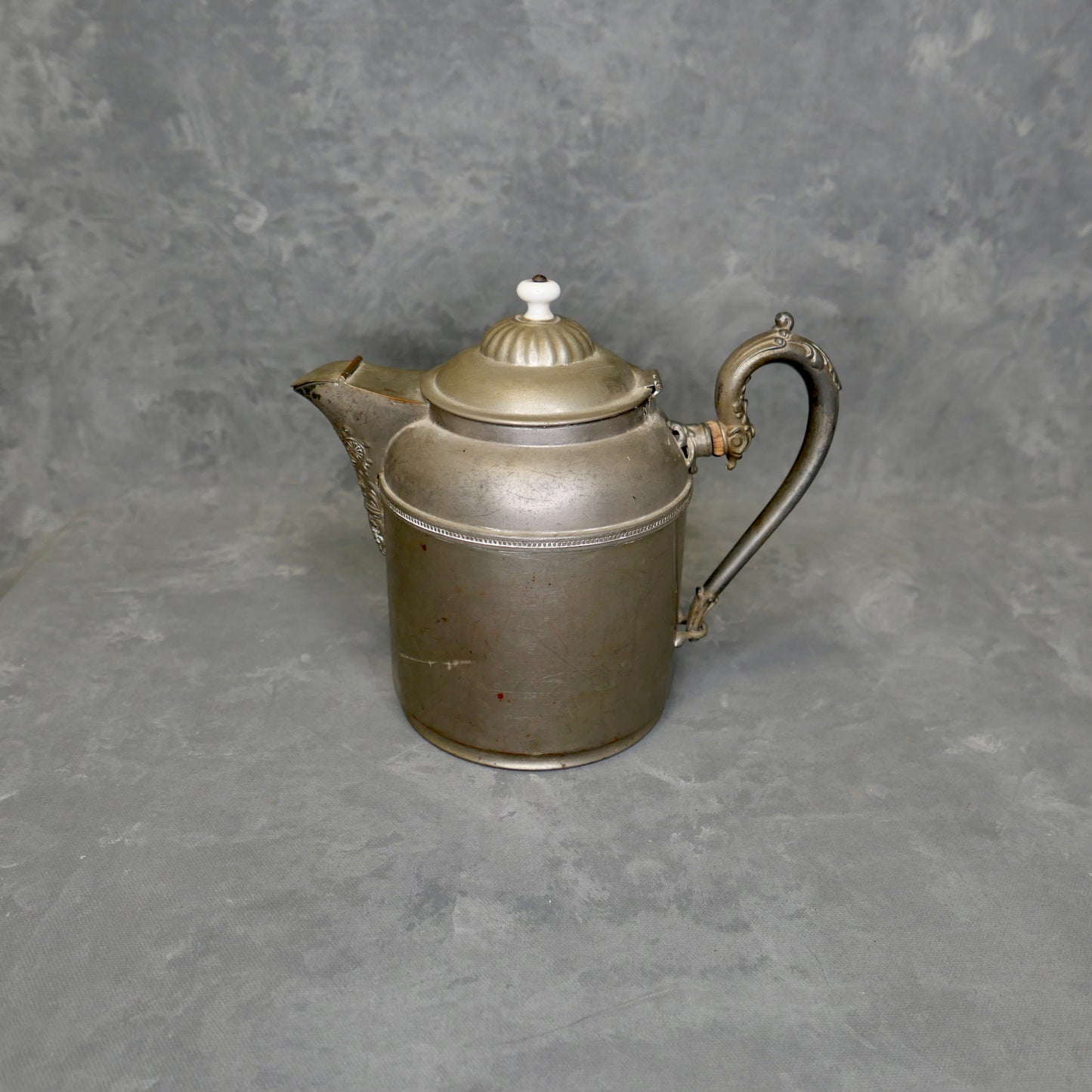 
                  
                    Vintage Metal Tea Kettle
                  
                