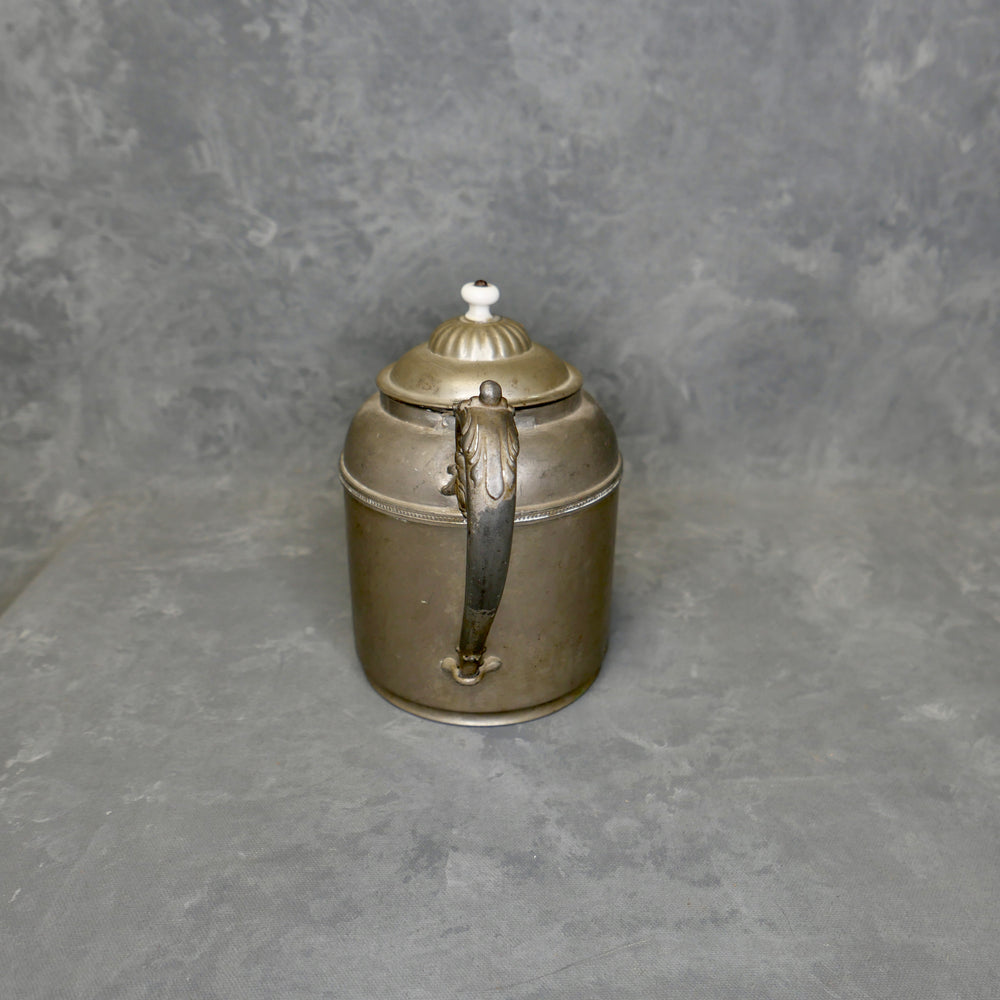 
                  
                    Vintage Metal Tea Kettle
                  
                